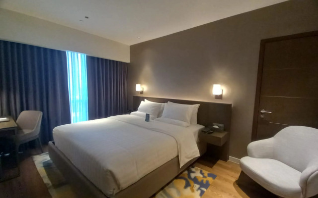 Capital O 950 Acqua Novotel Tower