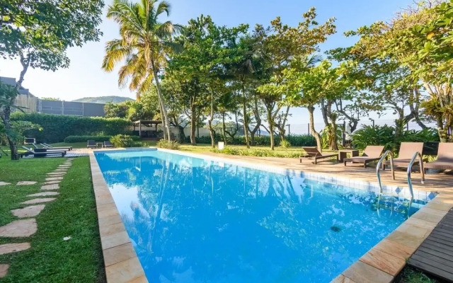 Pé na areia com charme e elegância