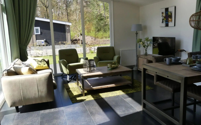 Modern Chalet With A Barbecue At The Forest