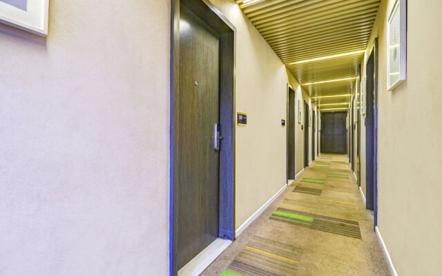 Fabhotel Prime Oasis Blue