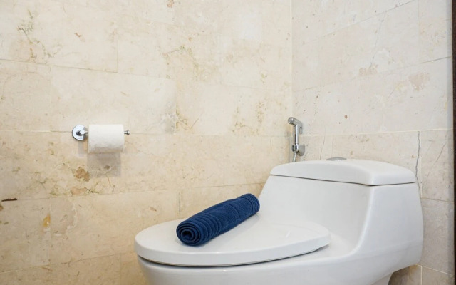 Cozy 2BR at Empyreal Epicentrum Apartment By Travelio