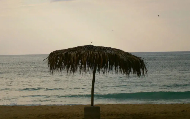 Sunset On The Beach Resort