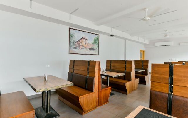 Capital O 22459 Edasserys Kalamassery Tourist Home