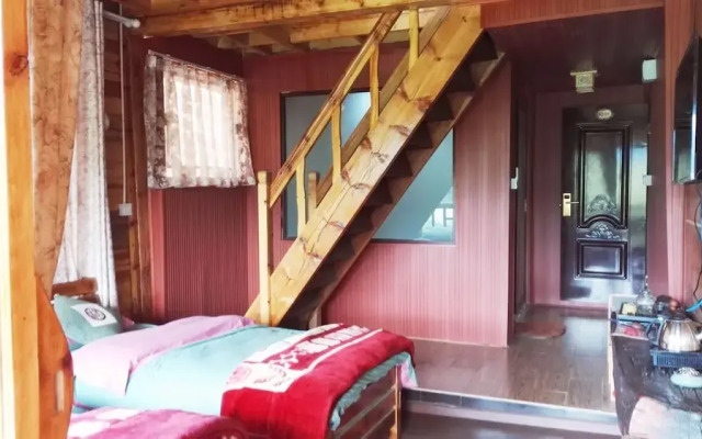 Luguhu Lakeside Apu Guest House