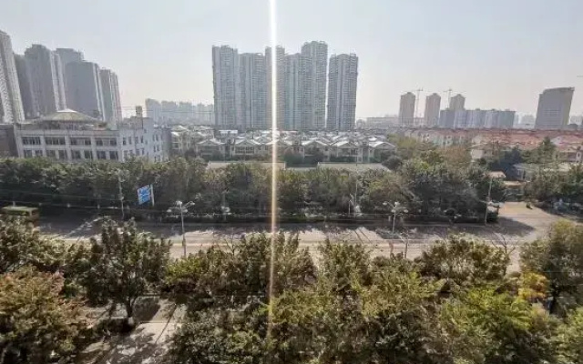Jingtone Hotel (Laibin City Square Wal-Mart Binjiangyuan)