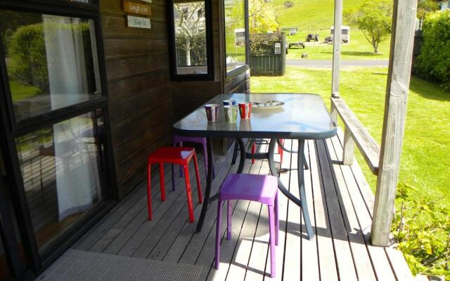 Fun at Wharekaho - Simpsons Beach Holiday Home