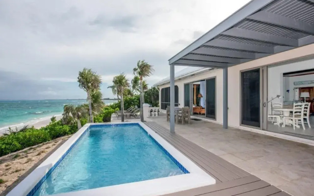 Seven Palms Serenity: Beachfront Oasis