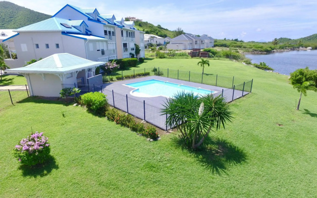 Le Baileys - Spacieux appartement en rez-de-jardin vue lagon