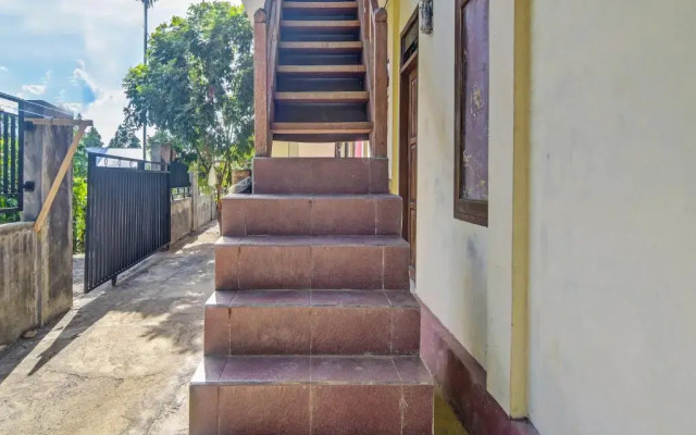 SPOT ON 91799 Sosonopan Homestay Near LANTAMAL VIII MANADO