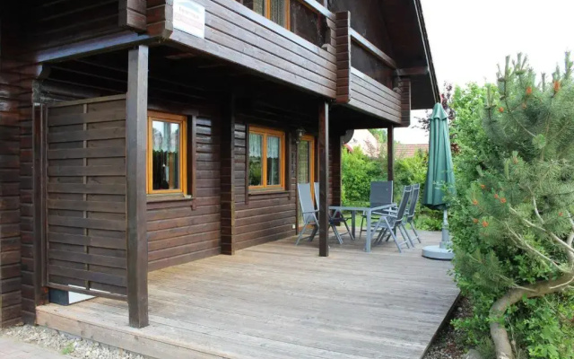 Holzblockhaus mit Kamin am Kite-, Surf- und Badestrand