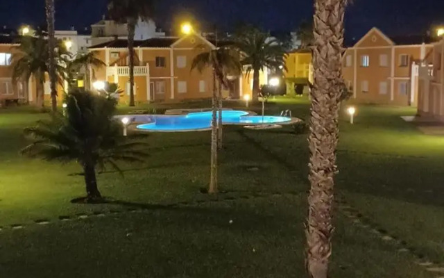 Oliva Nova flat in front of MET