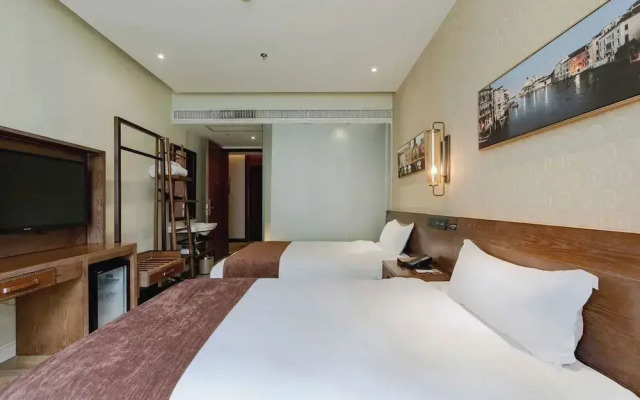 Xingyi Chain Hotel Jiangxia Metro Station