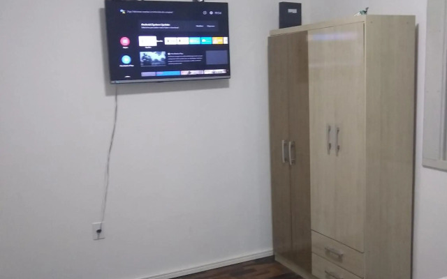 Quarto aconchegante em Apê, no Calçadão