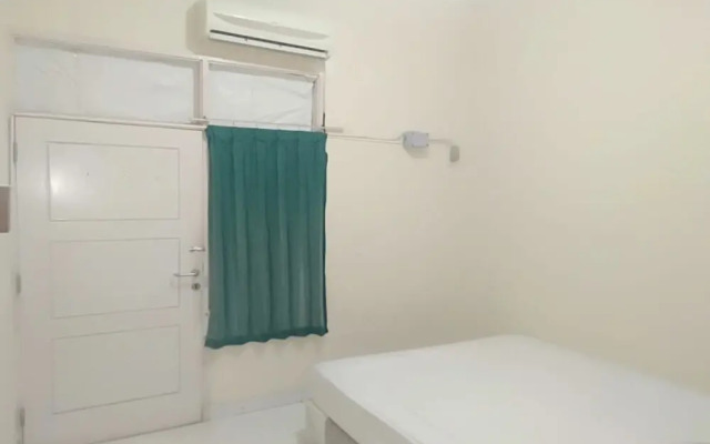 SPOT ON 93464 Penginapan Tulimario Syariah