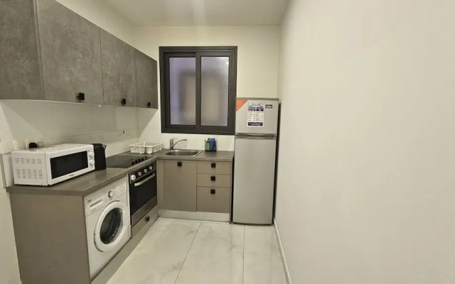 12 LCA - Stay Finibreeze Apartment