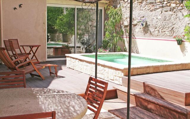 Alluring holiday home in Cazouls D'hérault with pool