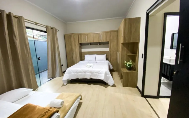 Casa Central piscina e AC para 8 hospede