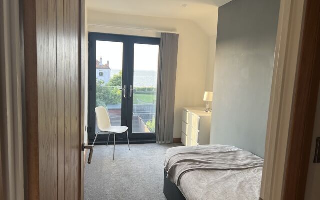 Broadway Beach Homes Airbnb With Hot tub