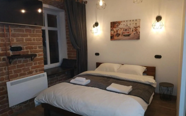 Loft апартаменти з балконом в центрі Львова