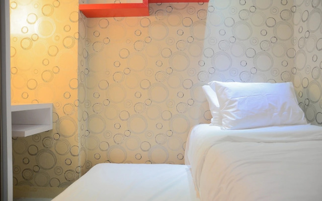 Homey and Relaxing 2BR Green Pramuka Apartment