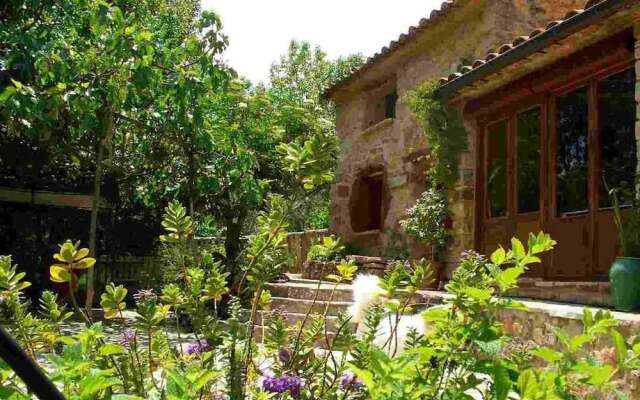 Masía La Posada del río Carbo