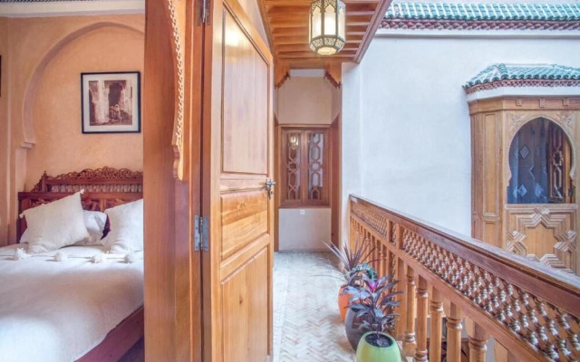 "room in Guest Room - Riad Lakouas Triple Room With Pool View"