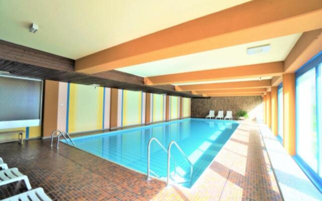 Lovely 1-bedroom vacation studio apartment with pool and sauna