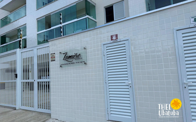 Apto completo e confortável com roupa de cama nas Toninhas  Condomínio Lumière