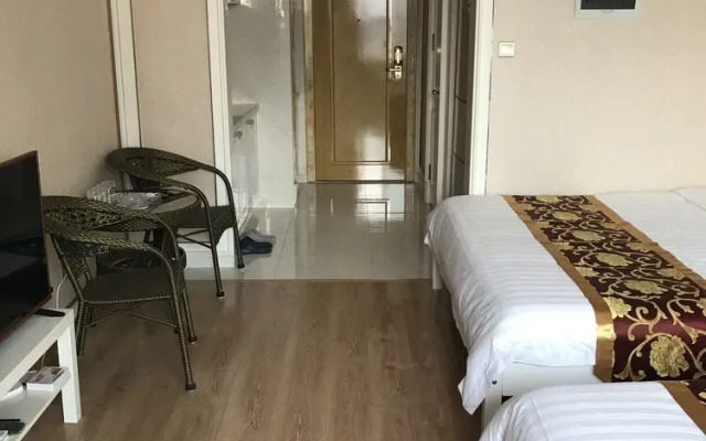 Dalian Xuanya Apartment