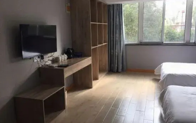 Pinghu liduo sheng business hotel