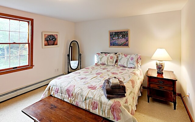 Woodsy Cape Cod Home by RedAwning