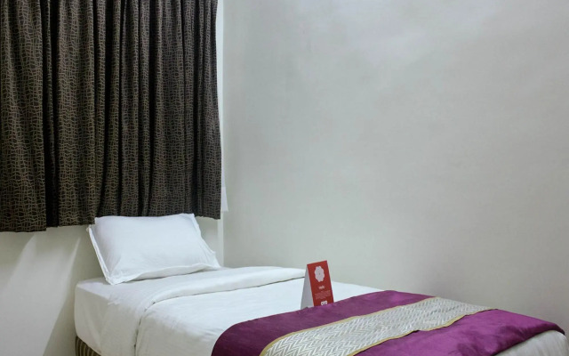 Rose Flower Service Apartment by OYO Rooms