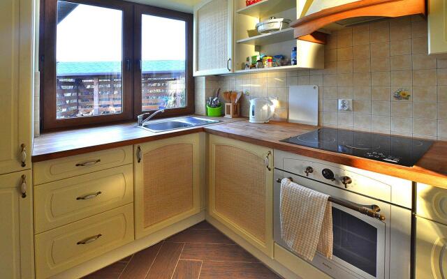 Holiday Home by Lake Rosnowskie With Boat