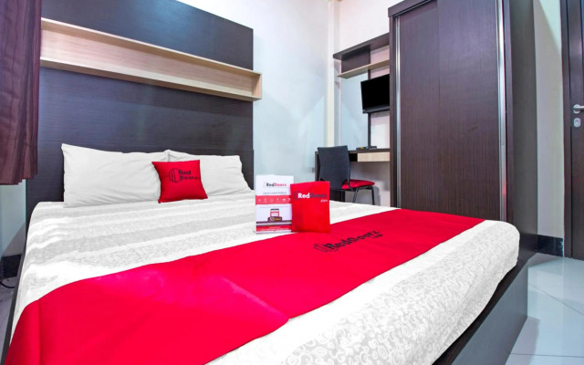 RedDoorz Plus near Isola UPI