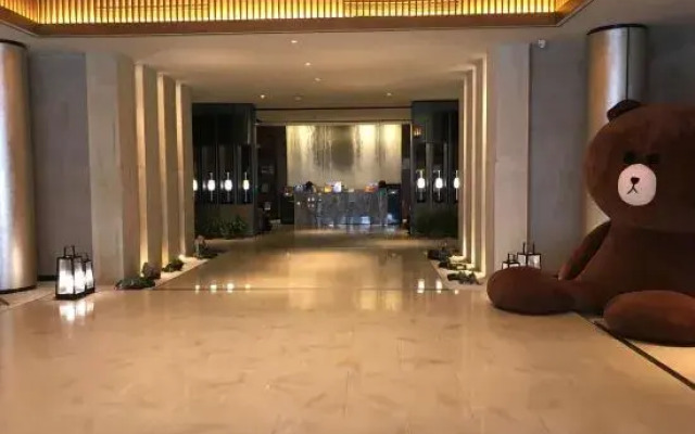 New Beacon Yunman Internation Hotel (Yingshan Tourist Center Chaxiang Small Town)