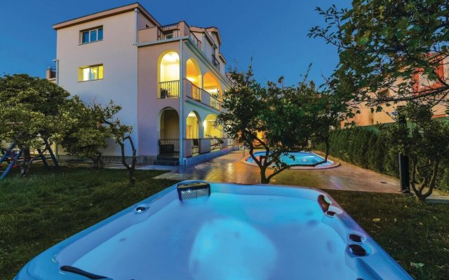 Awesome Home in Kastel Stafilic with Hot Tub, WiFi & 4 Bedrooms