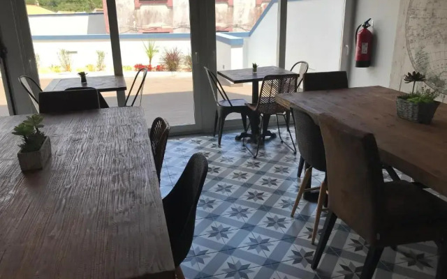 Royal Beach Hostel & Suites