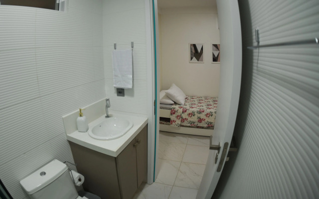 Pé na areia do Caribessa - Branco Haus