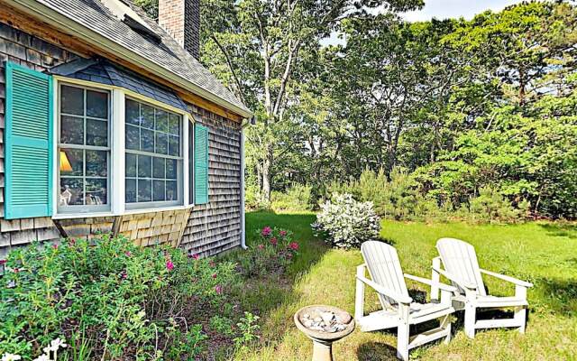 Woodsy Cape Cod Home by RedAwning