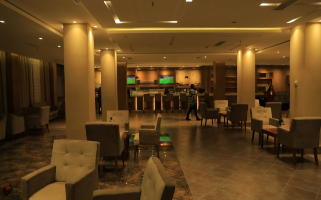 Kenenisa.. Oasis International Hotel