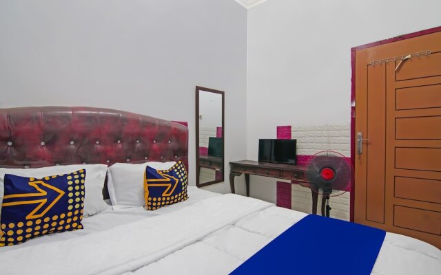 SPOT ON 92570 Putri Guest House Syariah Near SPBU Rimbo Panjang