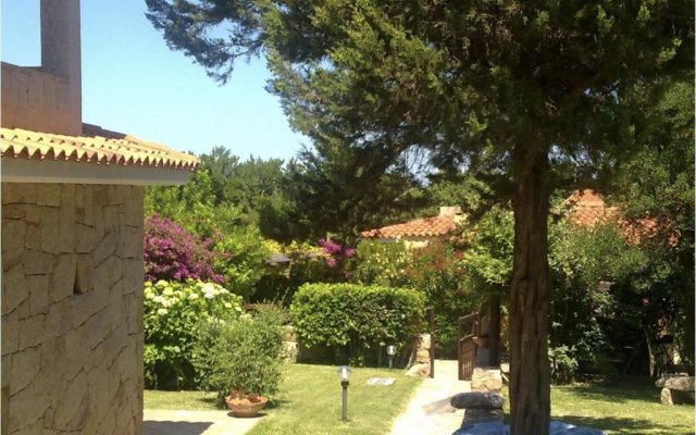 House with 3 bedrooms in Cannigione with wonderful sea view enclosed garden and WiFi 600 m from the beach