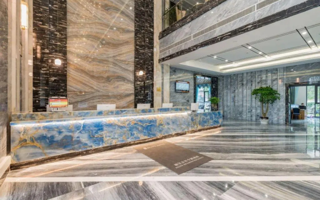 Rezen Hotel Wansheng International