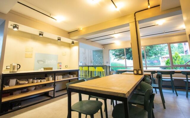 Apart Hotel el Jardin de los Presentes