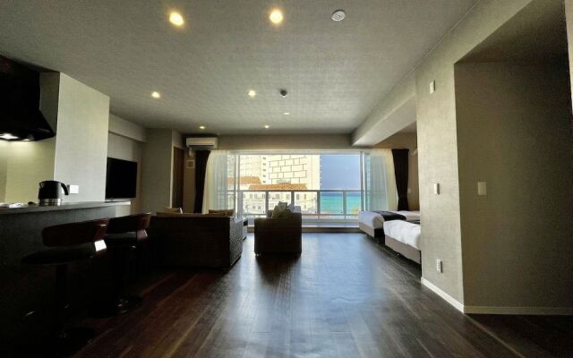 Coral Palace Onna by Sunset Avenue