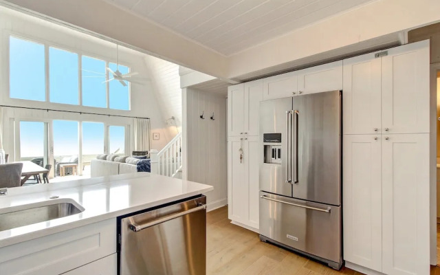 Roomy Chalet-Style Beachfront Condo with Private Beach Access by RedAwning