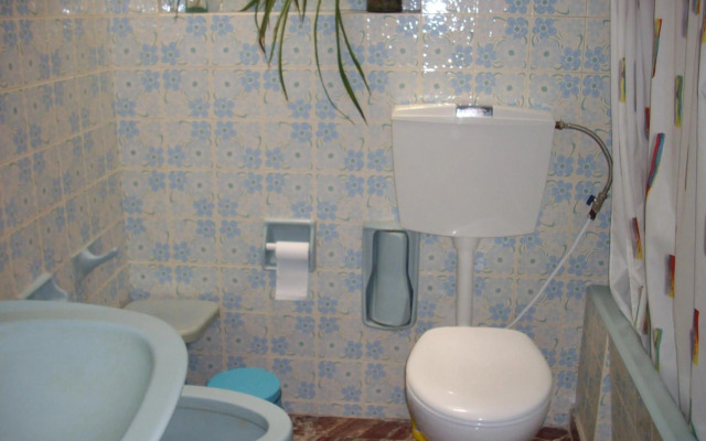 Anna in front of the sea Apartment