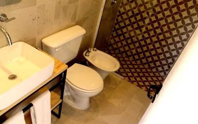 Apart Hotel el Jardin de los Presentes