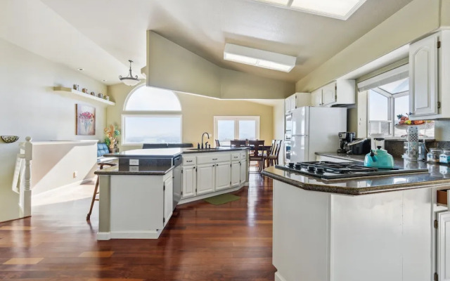 Elegant Escape 4 Bedroom Home by RedAwning