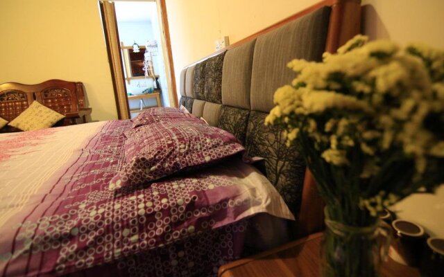 Lijiang Shuhe Shi Wu Wan Hostel